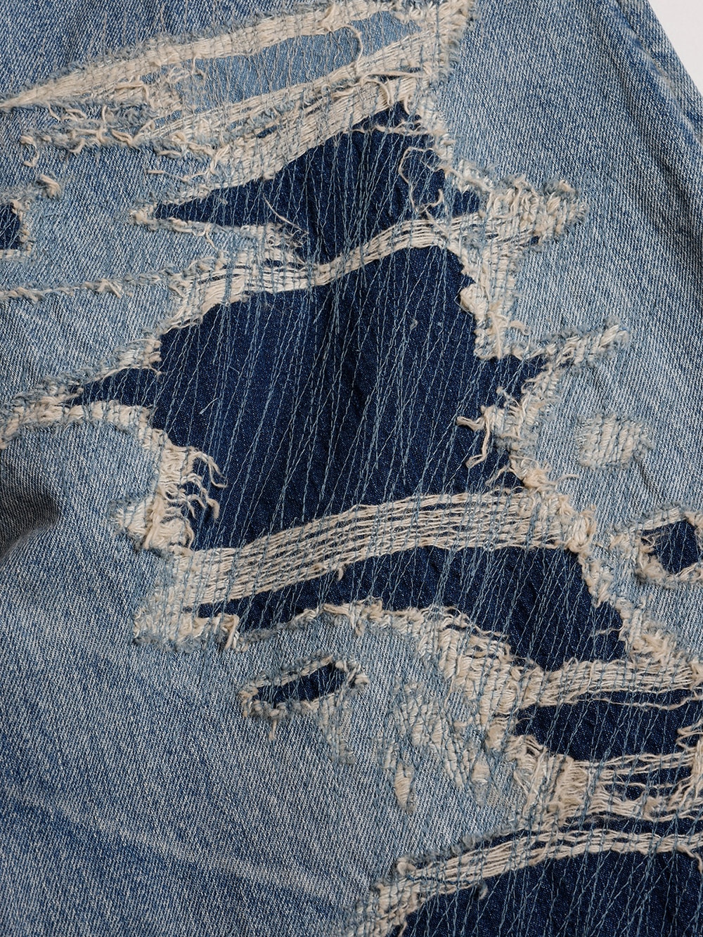 Product shot of multiple denims lined up