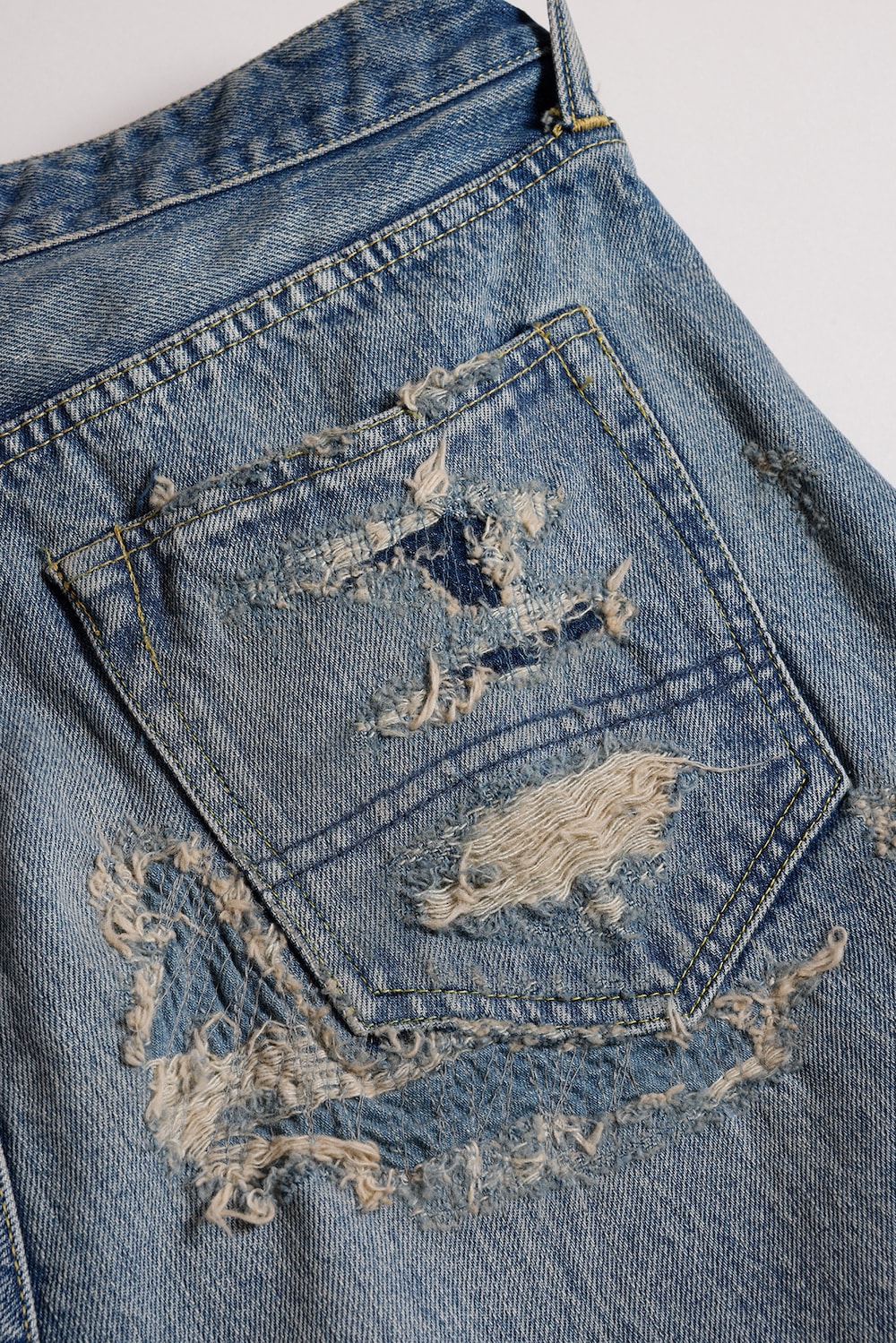 Close-up image of distress processing and repair stitching