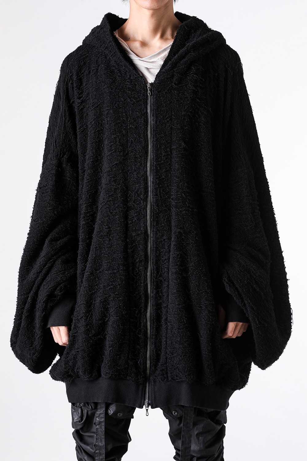 Close-up of the hood and body of the COTTON PILE JACQUARD ZIP UP HOODIE