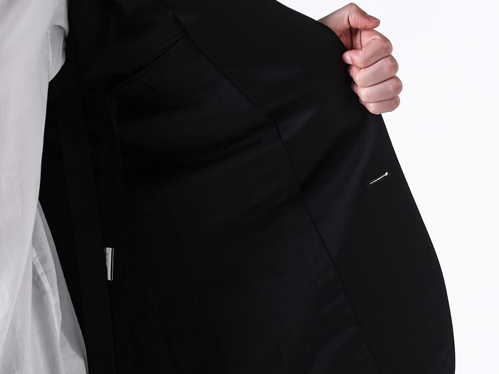 Wear image conveying the lightness as the sleeves are put on