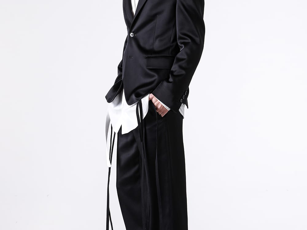 Full-body image of staff wearing the item