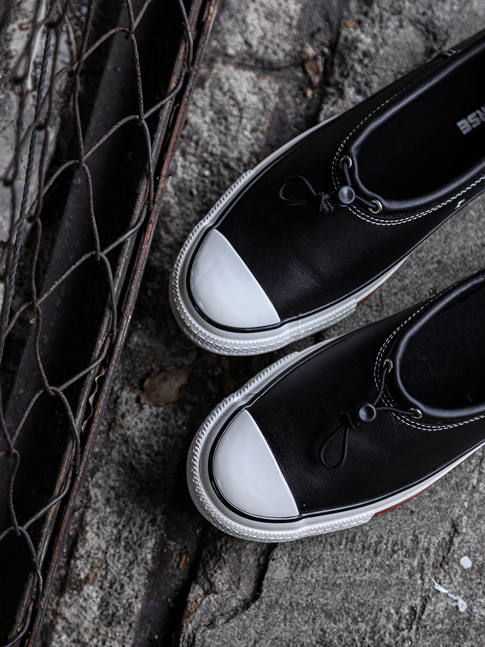 Close-up image of the front featuring a toggle instead of shoelaces