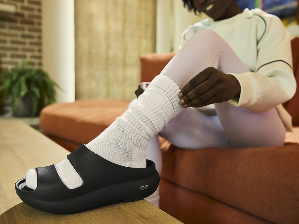 Wear image showing the straps securely holding the foot