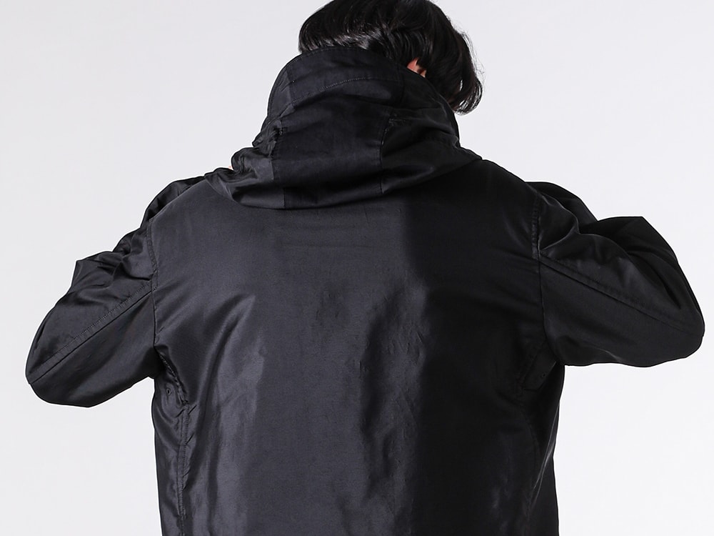 Close-up image conveying the fabric texture of the Ten C FAIR ANORAK