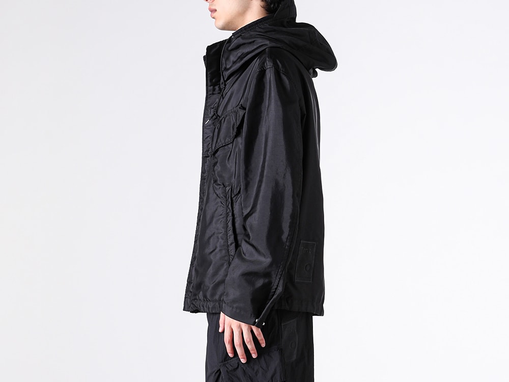 Side silhouette image of the Ten C FAIR ANORAK