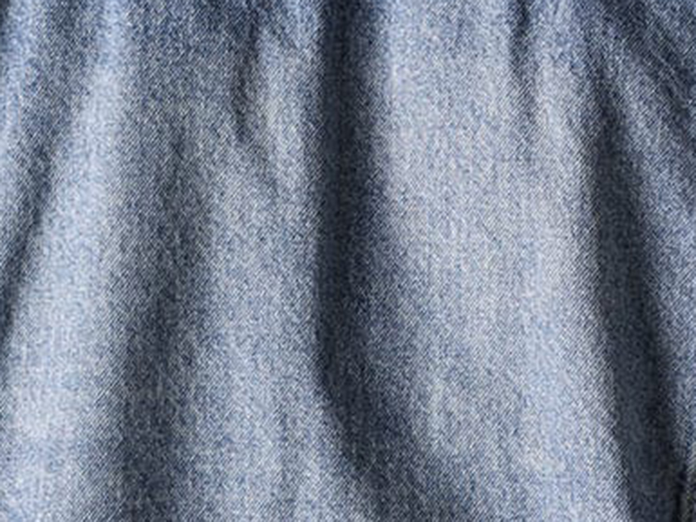 Close-up image conveying the texture of the 13oz Okayama denim