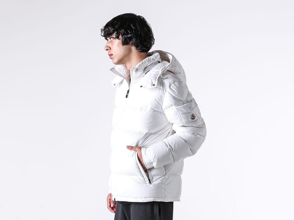 Close-up image of the shoulder area and logo of a short down jacket