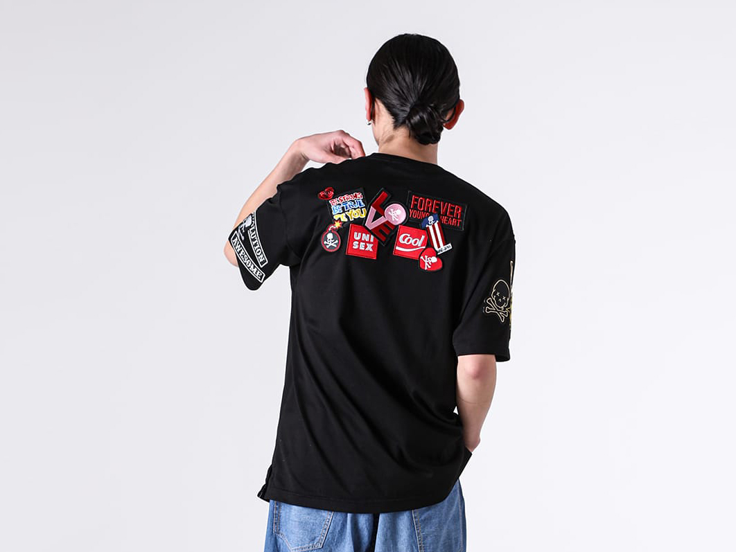 MULTI PATCHED SS TEE (TS107) Multiple Patch Decorations Adorning the Front, Back, and Both Sleeves