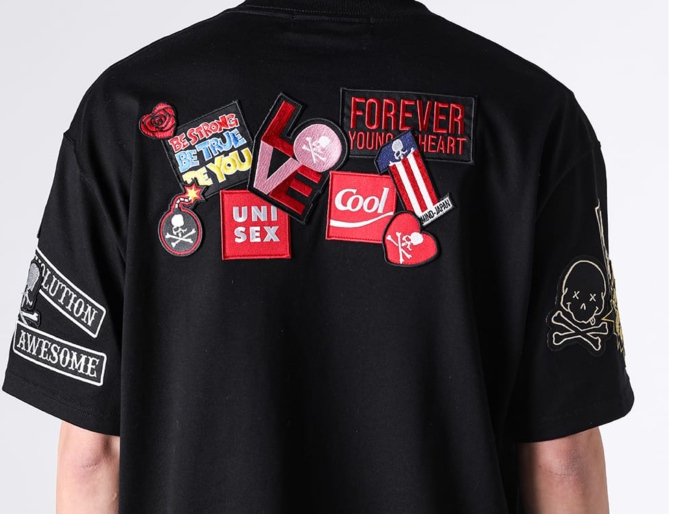 MULTI PATCHED SS TEE (TS107) Multiple Patch Decorations Adorning the Front, Back, and Both Sleeves
