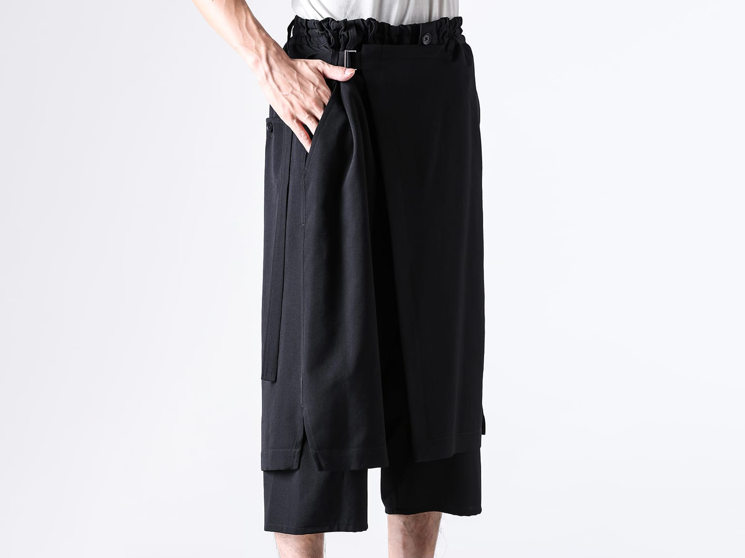 Side angle image of Ground Y's wrap pants