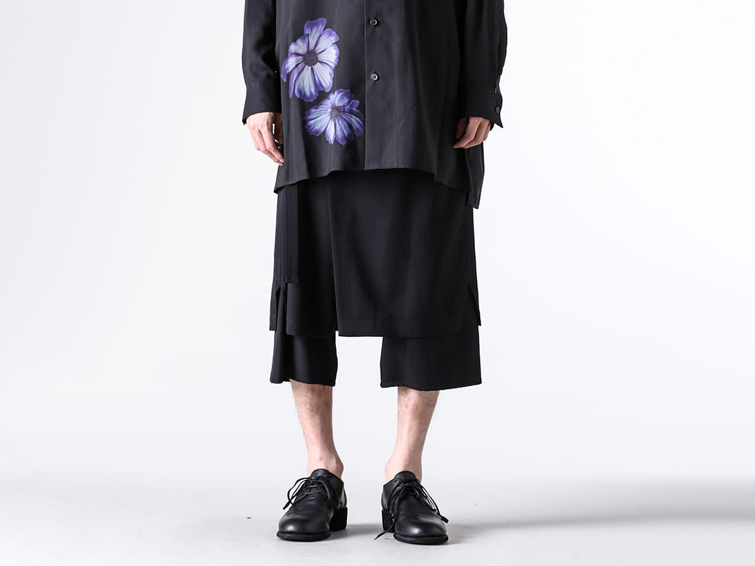 Wearing image showing the drape of Ground Y's wrap pants