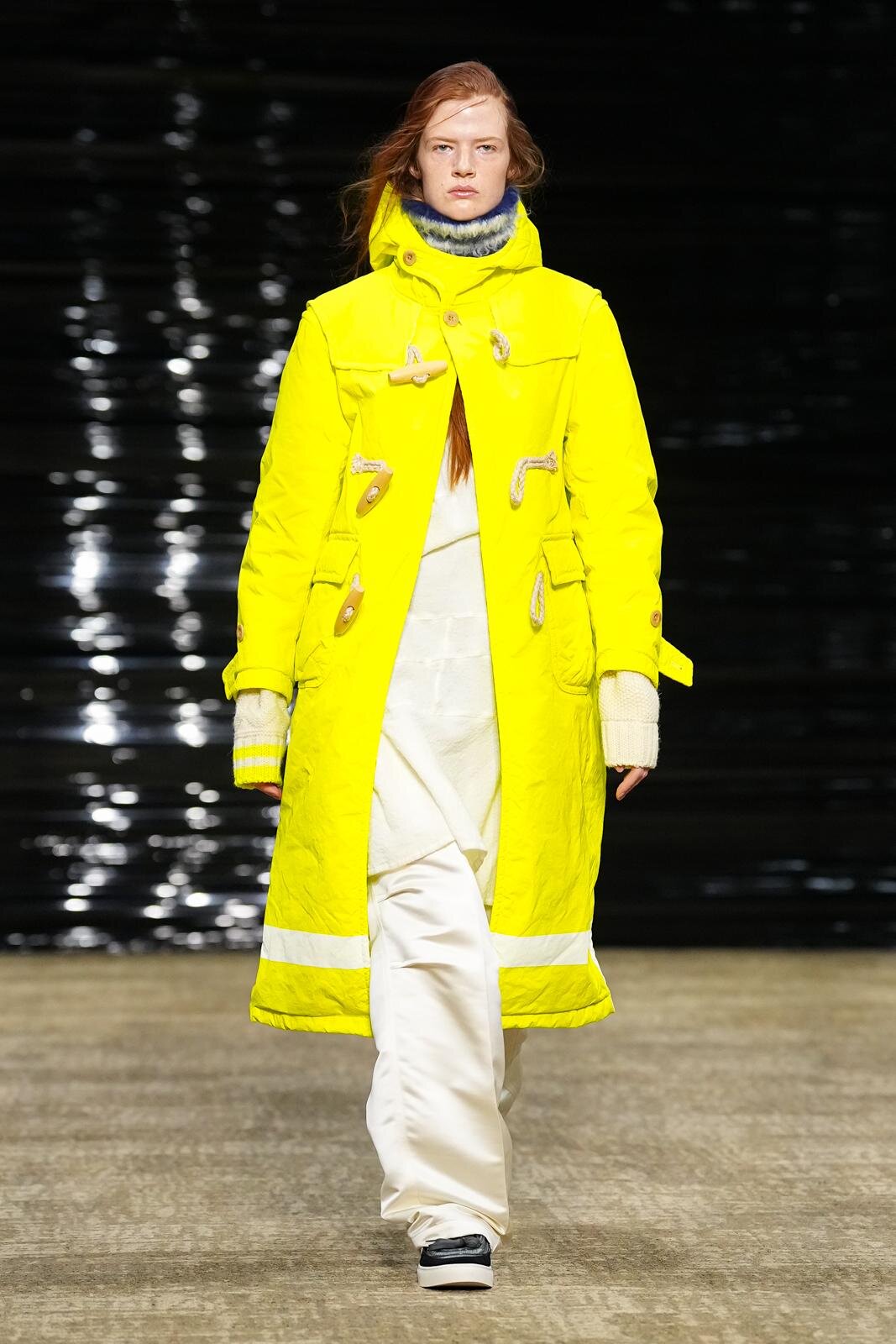 kolor 2026 Autumn/Winter late runway look wrapped in a vivid yellow fisherman-style duffle coat