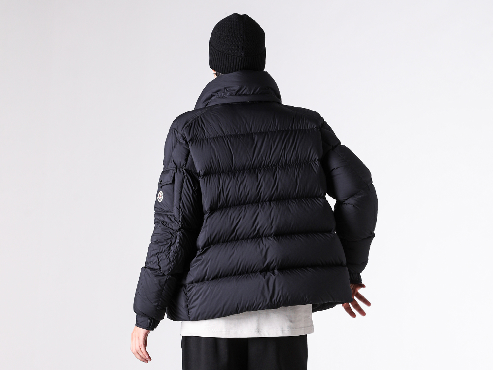 Macro close-up highlighting the texture of the MONCLER MAYA 70 nylon laqué fabric