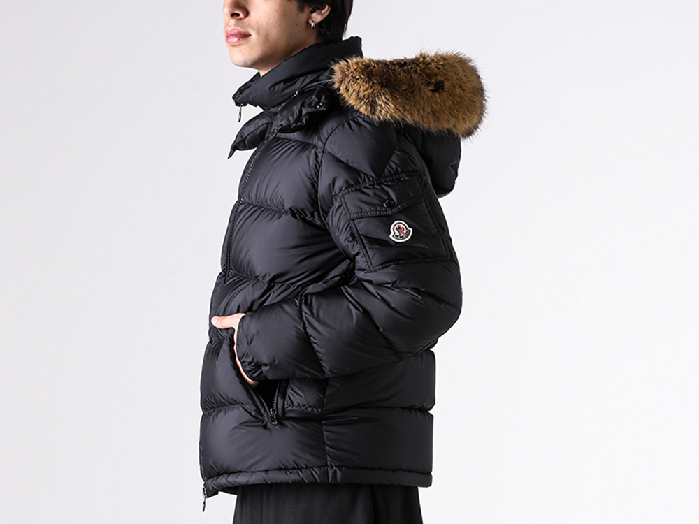 Detailed close-up view focusing on the hood construction and fur trim of the MONCLER MAYAF