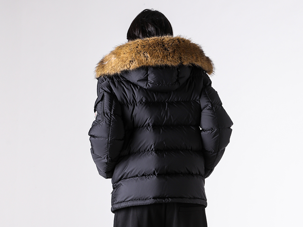 Macro close-up focusing on the weave and surface finish of the MONCLER MAYAF matte fabric