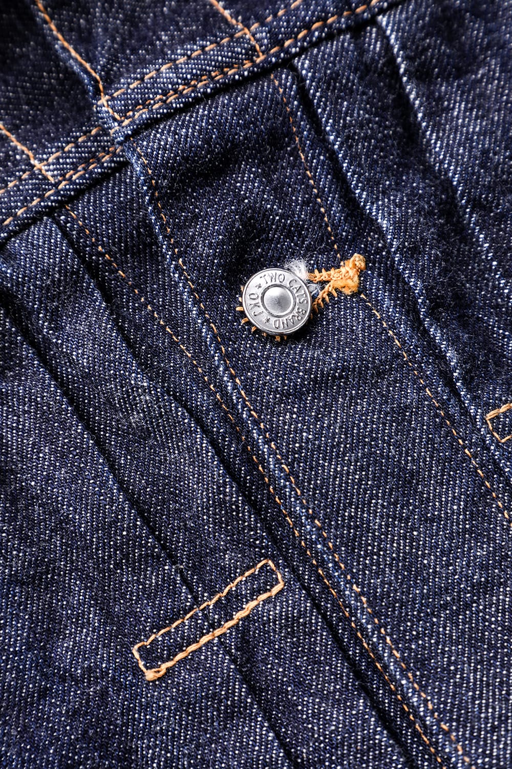 20's Jacketの濃いデニムの織り目とボタン、プリーツの押さえ